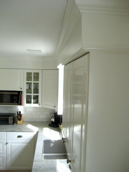 How to make the existing soffit look built in and installed crown molding. Kitchen With Soffit, Cabinet Soffit, Kitchen Bulkhead, Ikea Kitchen Installation, Cabinets Ikea, Kitchen Soffit, Cabinet Trim, Cabinets White, Cabinet Remodel