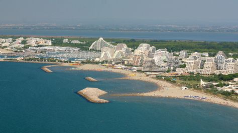 When Architecture and Tourism Meet: La Grande Motte's Pyramids by the Seaside La Grande Motte, 70s Photos, France Travel Guide, Seaside Resort, Summer Memories, Pink Lady, The Seaside, Montpellier, Beach Holiday