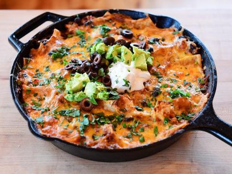 Enchilada Skillet Recipe | Ree Drummond | Food Network Ree Drummond Enchiladas, Cast Iron Enchiladas, Cast Iron Skillet Enchiladas, Pioneer Woman Enchilada Casserole, Enchilada Skillet Pioneer Woman, Enchilada Skillet Recipe, Skillet Enchiladas, Enchilada Skillet, Chicken Enchilada Skillet