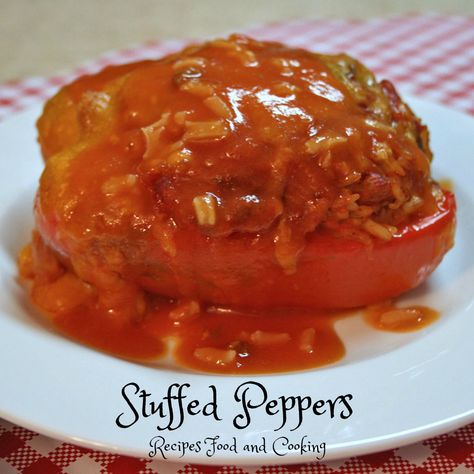 Stuffed Peppers filled with my mom's Spanish rice and topped with cheese and tomato sauce. Stuffed Peppers With Red Sauce, Stuffed Peppers With Tomato Soup, Stuffed Bell Peppers Campbells Tomato Soup, Stuffed Peppers With Tomato Sauce, Spanish Rice Stuffed Peppers, Sauce For Stuffed Peppers, Hamburger Dinners, Stuffed Recipes, Best Stuffed Pepper Recipe