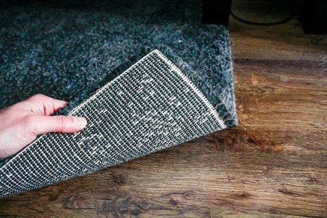 7 Ways To Flatten a Rug Drywall Taping, Concrete Sidewalk, Cheap Landscaping, Big Area Rugs, Ductless Air Conditioner, Paver Patios, Rug Tape, Modern Deck, Deck Building