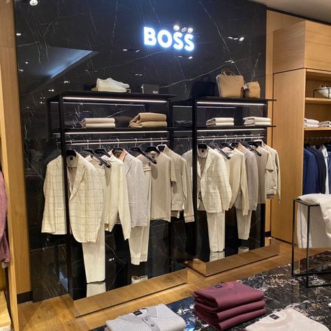 Check out this amazing #BeforeAndAfter of the Hugo Boss store! The wall cladding was transformed with Quartz, creating a stunning yet timeless look. #WallCladding #HugoBoss Hugo Boss Store, Wall Cladding, Hugo Boss, Fashion Store, Wall