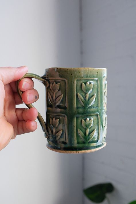 Dimensions 4.5" / 11.5cm tall 3" / 7.3 cm wide Holds 14oz / 414ml of liquid comfortably. each item is handmade, so dimensions can vary slightly! This is a taller version of my stamped mug : https://minipott.etsy.com/listing/1301764390 All my ceramic pieces are made-to-order and take 4-6 weeks production time :) I know this can seem like a long time to wait for your new piece, but remember that every made-to-order piece is made for you by me, working by myself to wedge, form, decorate, dry, bisqu Tulip Mug, Handmade Mug, Cute Mugs, Clay Projects, Cups And Mugs, Ceramic Mugs, Handmade Ceramic, Tea Mugs, Ceramic Pottery