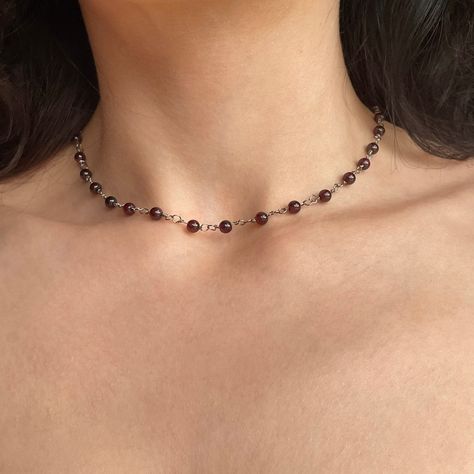 Natural Garnet Necklace, Garnet Gemstone Bead Rosary Style Necklace, Womens Crystal Gothic Choker Necklace, January Birthstone, Gothic Style MATERIALS: Crystal Beads: Natural Garnet Crystal Clasp & Chain: Stainless Steel (no tarnishing) Wire Links: Steel (no tarnishing) NECKLACE SIZE: Length: Approx 35.5cm-40.5cm (Fully closed & fully loosened) Width: Beads approx 0.4cm BRACELET SIZE: Length: Approx 14cm-19cm (Fully closed & fully loosened) Width: Beads approx 0.4cm DELIVERY: (UK) Time: Dispatch Gothic Choker Necklace, Ethereal Jewelry, Rosary Style Necklace, Gothic Choker, Bead Rosary, Gothic Chokers, Garnet Necklace, January Birthstone, Funky Jewelry