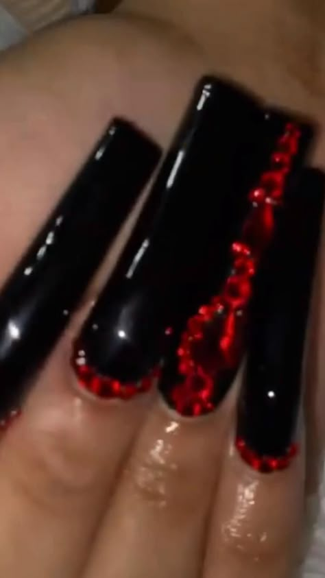 Black with red buttom 
 • Black lovers . Acrylic nails🖤🖤🖤🖤 Black Nail With Red Rhinestones, Red And Black Ballerina Nails, Red Bottom Acrylic Nails With Diamonds, Red And Black Nails Sparkle, Black Nails With Red Diamonds, Acrylic Nails With Red Underneath, Red And Black Sweet 16 Nails, Glitter Red Bottom Nails, Black Nails With Red Gems