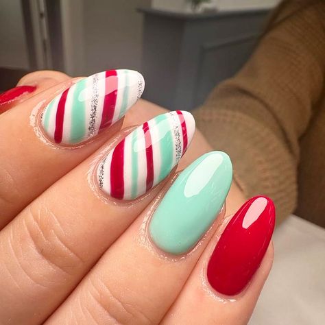 Candy cane dreams 🍭 By India 🥰🤤 #nails #gelnails #nailart #nailsofinstagram #christmasnails #worthing #worthingnails #westsussex… | Instagram Candy Cane Pedicure, Christmas Candy Nail Art, Candy Cane Nail Ideas, Candycane Nailart, Candy Cane Nails Christmas, Christmas Light Nail Designs, Candy Cane Acrylic Nails, Candy Cane French Tip Nails, Pink Candy Cane Nails