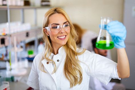 Young attractive female scientist researching in the laboratory by nd3000. Young beautiful woman scientist researching in the laboratory #Sponsored #female, #scientist, #Young, #attractive Lab Assistant, Female Scientist, Medical Syringe, Chemistry Laboratory, Science Girl, Lab Technician, Women Scientists, Chemistry Labs, Urban Farm