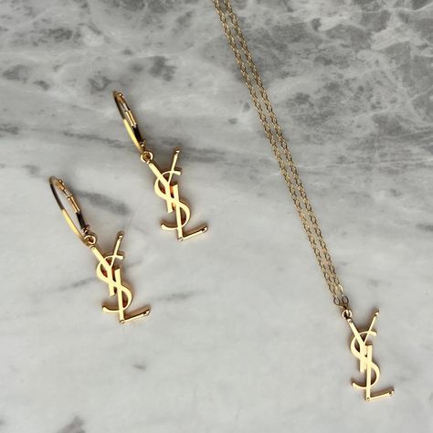 ✨ Our repurposed YSL logo earrings and necklaces are back in stock! These never stick around for long so head to our website if after either of these lovely pieces, or both! ✨ Hand crafted in Melbourne. ✨ Free shipping Australia wide & AfterPay available Ysl Necklace, Ysl Jewelry, Vintage Yves Saint Laurent, Ysl Logo, Gold Filled Hoops, Bracelet Charms, Saint Laurent Paris, Gold Logo, Back In Stock