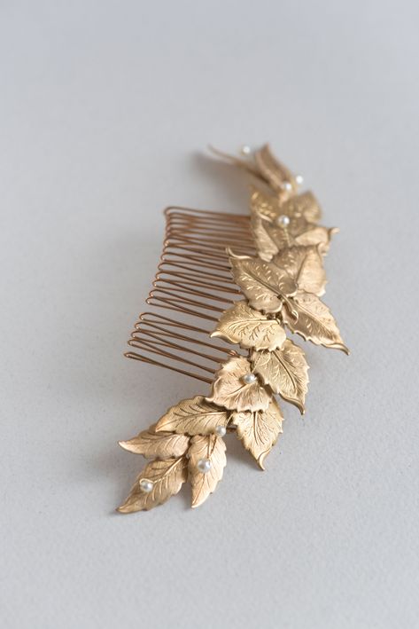 Beautiful gold wedding headpiece, gold leaf hair comb, inspired by old tiaras. This bridal comb is made from gold brass leaves, decorated with Swarovski pearl beads. Completely handmade in my studio, using only the best materials, and a lot of love:) - Measures: 5,5 inches (14 cm). - Used materials: gold brass charms, Swarovski pearl beads, metallic hair comb, wire. - Packaging: carefully packed for safe shipping. - Ready to ship in 7 business days. - Express delivery available. - Each piece may Violin Concert, Gold Headpiece Wedding, Gold Bridal Hair Accessories, Gold Leaf Hair, Gold Hair Comb Wedding, Fern Wedding, Gold Bridal Hair Comb, Leaf Headpiece, Prom Hair Accessories