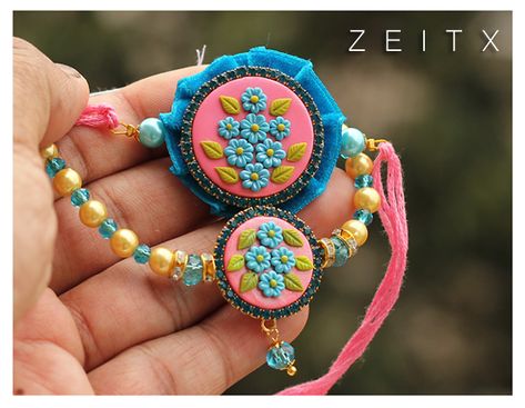 Embroidery Rakhi Design, Embroidery Rakhi, Clay Embroidery, Wedding Favor Gift Boxes, Handmade Rakhi Designs, Rakhi Making, Polymer Clay Embroidery, Handmade Paintings, Handmade Rakhi