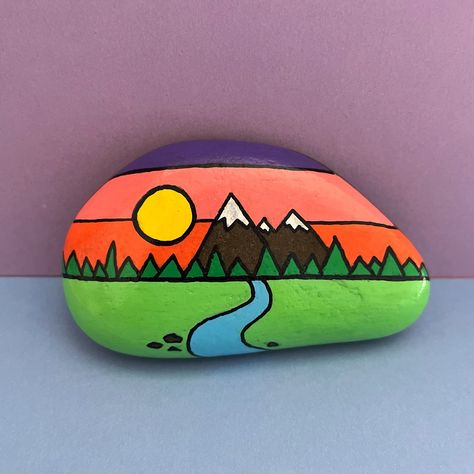 1 of 1! 🤩 Hand painted acrylic rock painting, on natural beach pebble! ⛰️🏔️ Sealed with varnish 🎨 Hand signed on back ✍️ (Colours may vary slightly) Smile Rock Painting, Round Painted Rocks, Painting Mountains On Rocks, Scenery Rock Painting, Art Rocks Painting, Rectangle Rock Painting Ideas, Landscape Rock Painting Ideas, Rock Painting Nature, Nature Rock Painting Ideas