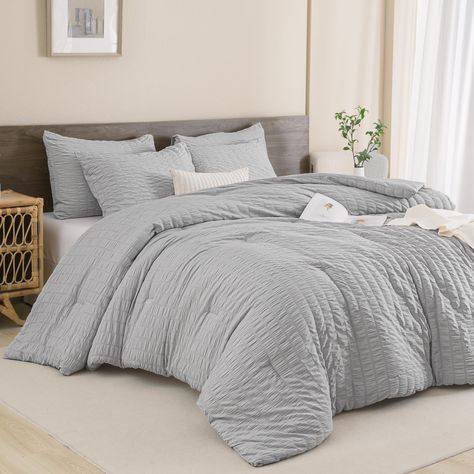 PRICES MAY VARY. 【Premium Material】: Andency light grey comforter set is soft and lightweight, like a cloud; the thickness offers just-right the warmth which is suitable for all seasons. The microfiber filler offers good fluffy performance and breathability. The solid comforter set uses 100% cationic dyeing seersucker fabric on the front side, providing a different feeling; the backside brushed polyester material of the comforter is ultimate softness and coziness. 【Chic Seersucker Design】: Are y Bedroom With Grey Comforter, Gray Comforter Bedroom Ideas, Light Gray Comforter, Light Grey Comforter, Grey Comforter Bedroom, Textured Comforter, Bedding Comforter Sets, Twin Size Comforter, Modern Comforter