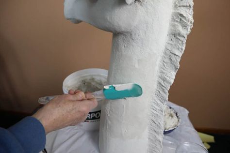 Apply joint compound to make the paper mache clay smooth. Paper Mache Paste, Giraffe Sculpture, Beautiful Sculptures, Making Paper Mache, Paper Mache Animals, Giraffe Head, Paper Mache Clay, Clay Sculptures, Head Sculpture