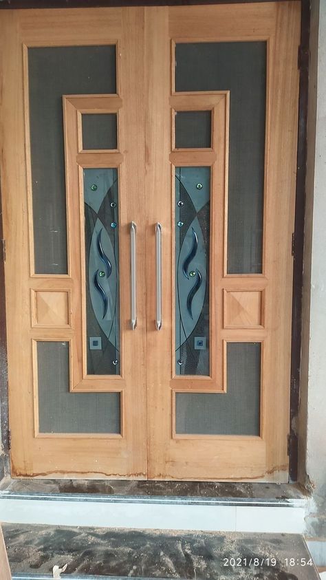 Mane Door Design Modern, Jaali Door Design Wooden Double, Double Door Jali Design, Front Jali Door Design Modern, Main Jali Door Design Modern, Double Door Design Wood Jali, Front Jali Door Design, Simple Door Design, Jali Door Design Modern