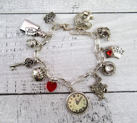 You've probably heard many times that to wear the right clothes, you need the right jewelry to achieve more innovative, unforgettable and unique styles. You can quickly achieve this with our different types of charm bracelets! #bracelets #charms #charmsbracelets #planetcharms #jewelrycharms Alice In Wonderland Outfit, Alice In Wonderland Gifts, Alice In Wonderland Tea Party Birthday, Mad Hatter Hat, Disney Charms, Bracelets Charms, Jewelry Styles, Sterling Silver Charm Bracelet, Disney Jewelry