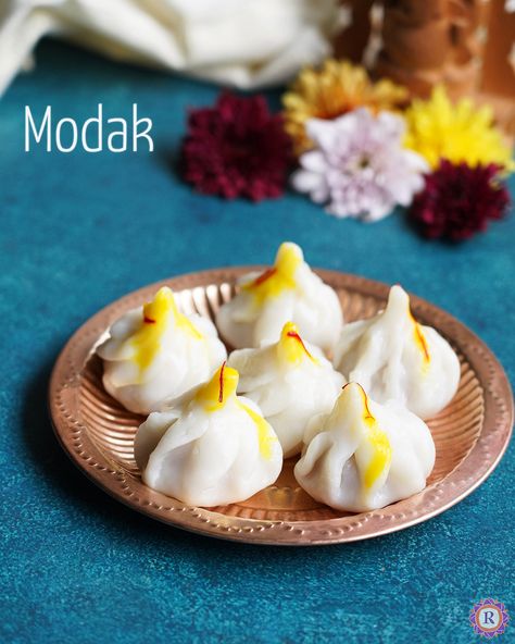 Modak is a sweet dumplings made from rice flour offered as prasad to Hindu God Ganesha during the festival of Ganesh Chaturthi. It is also called Ukadiche modak in Maharashtra which means 'Steamed modak'. In this post, let's see how to make this easily at home especially with step by step images and video for... Read More The post Modak Recipe | Ukadiche Modak appeared first on Raks Kitchen. Modak Sweet Images, Ukadiche Modak, Modak Recipe, Marathi Culture, Fast Cooking, Sweet Dumplings, How To Make Dough, Happy Navratri Images, Navratri Images