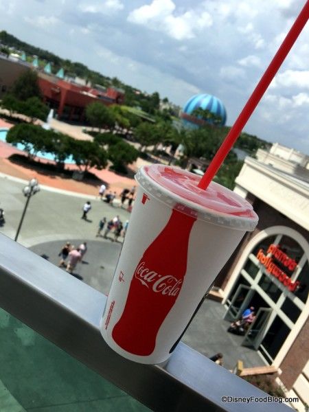 Celebrate National "Have a Coke Day" With BOGO Fountain Drinks at the Coca-Cola Store Orlando in Disney Springs | the disney food blog Disney Cocktails, Coca Cola Store, Disney Drinks, Fountain Drink, World Of Coca Cola, Disney Dining Plan, Disney Food Blog, Disney Dining, Disney Springs