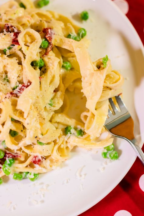 Christmas Eve Fettuccine Recipe | Holiday Fresh Pasta Dinner Dishes, Recipes | Fettuccine Alfredo Sauce with Sun-Dried Tomatoes, Lemon, Garlic, and Peas | How To Cook Fresh Pasta | Roll Noodles With Your Kitchen Aid Attachment | Aesthetic Photography Christmas Fettucine Alfredo, Christmas Fettucine, Attachment Aesthetic, Christmas Fettuccine, Fettuccine Alfredo Sauce, Cooking Fresh Pasta, Fettuccine Recipe, Pasta Gnocchi, Fettuccine Recipes