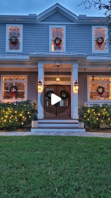 Jess Davis on Instagram: "✨Christmas light hack✨ if you hate ladders and the cold, try hanging your lights INSIDE your 🪟 this year! Save this for exterior decorating, it is so easy and turns out just like the home alone house🥹

 Use the velcro command strips, they hold best- command hooks in the corners and the small plastic ones in the centers on top and bottom to make sure the lights frame window glass. Run any extra along the base of the window and you get cozy twinkle inside and out! ✨ 

Have you tried this yet? Besides in high school ?😜🤘" Christmas Outdoor Wreaths Window, Lights In Window Christmas, Christmas Lights Under Kitchen Cabinets, Interior Window Christmas Lights, Wreath And Candle In Window, Front Christmas Lights, House With Wreaths On Windows, Christmas Lights Window Outdoor, How To Install Christmas Lights On House