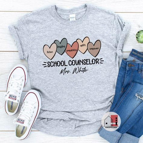 Customized School Counselor Shirt, School Counselor Tee, Counselor Shirt, Gift for School Counselor, Multi Hearts School Counselor Shirt. https://etsy.me/3KyRsvZ #shortsleeve #schoolcounselor #counselorshirt #mentalhealthschool #counselortee #counselingshirt #counselor Counselor Shirt Ideas, School Counselor Tshirt Ideas, School Counselor Shirt Ideas, Counselor Tshirt Ideas, Counselor Shirts, School Counselor Shirt, Counselor Shirt, School Counselor Office, Counselor Office