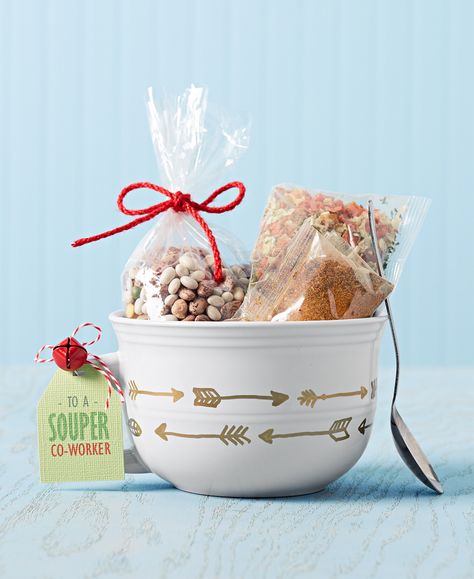 Transform a budget-friendly ceramic mug or bowl into a charming Christmas gift using paint markers. Once personalized fill the cup with packages of dry soup mixes or other wintry treats. Add a clever gift tag to top off this darling DIY present. #diychristmasgift #diygift #homemadechristmasgifts #easydiygifts #bhg Soup Mixes For Gifts, Soup Gift Basket Ideas, Soup Gift Basket, Dry Soup Mixes, Soup Gifts, Christmas Soup, Dry Soup Mix, Homemade Food Gifts, Christmas Bowl