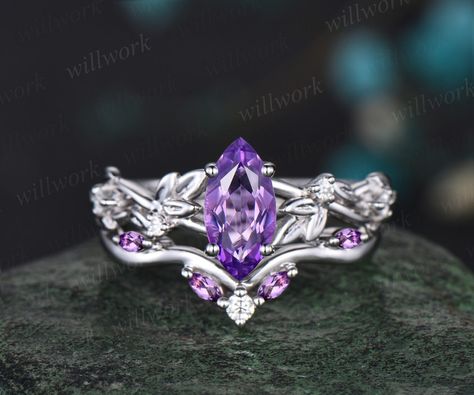 This ring is handmade by myself. The main stone is a 5x10mm marquise cut natural amethyst,about 1ct. The accent stones are round diamonds or moissanites. The wedding band stones are natural amethyst and diamonds or moissanites. The material is solid gold(white,yellow,rose gold available) Ring size can be choose from the selection box. This jewelry can also be made in solid 10k,14k,18k gold,with real diamonds.Contact me! Need rush order? contact me! Need custom making order? Contact me! I have co Amethyst Emerald Cut Ring, Purple Wedding Ring, Purple Wedding Rings, Amethyst Wedding Rings, Amethyst Engagement Ring, Engagement Ring Women, Diamond Bridal Ring Sets, Emerald Wedding Rings, Amethyst Ring Engagement