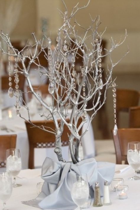 75 Charming Winter Centerpieces | DigsDigs Winter Table Centerpieces, Winter Wedding Trends, Silver Winter Wedding, Wedding Table Themes, Branch Centerpieces, Winter Wedding Centerpieces, Interior Boho, Winter Centerpieces, Wedding Table Designs