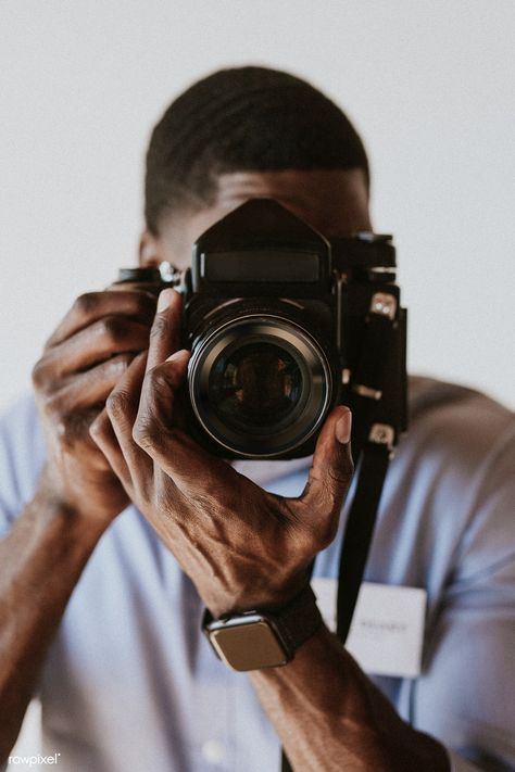 Black photographer capturing a picture with a retro film camera | premium image by rawpixel.com / Felix Artist Pictures Photographs, Portraits Of A Photographer, Camera Pictures Image, Black Photographer Aesthetic, Camera Man Photographers, Photographer Photoshoot With Camera, Photographer Aesthetic Camera, Photographer Poses With Camera, Raw Portrait