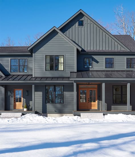 Modern Grey Farmhouse Exterior, Dark Exterior Modern Farmhouse, Dark Grey Modern Farmhouse Exterior, Modern Exterior Colors For House, Charcoal Farmhouse Exterior, Dark Gray Home Exterior, Dark Blue Farmhouse Exterior, Blue Modern Farmhouse Exterior, Dark Gray Farmhouse Exterior