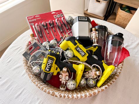 Landscape shot of the finished gift basket filled with tools bought at The Home Depot. Holiday Gift Baskets, Multipurpose Tools, Nutcracker Ornaments, Screwdriver Set, Protein Smoothie, Disco Ball, Practical Gifts, Gift Baskets, Some Fun