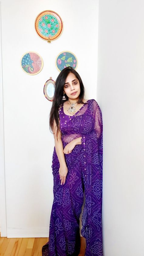 Purple chiffon bandhani saree with rawsilk blouse paired with pearl kundan choker Purple Bandhani Saree, Bandhani Saree, Chiffon Saree, Raw Silk, Chiffon, Saree, Purple