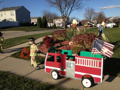 Getting crafty for Halloween Halloween Fire Truck Wagon, Wagon Fire Truck Diy, Firetruck Wagon Halloween, Fire Truck Wagon Diy, Wagon Floats Ideas Kids, Diy Fireman Costumes, Wagon Halloween Costumes, Wagon Floats, Firefighter Halloween