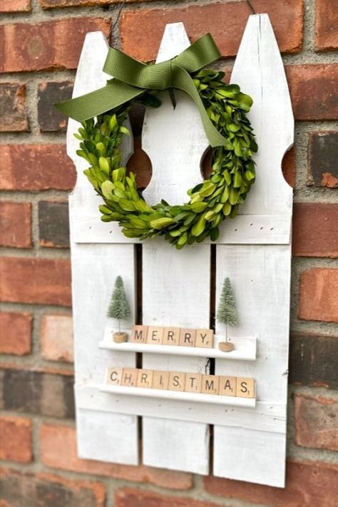 How to Use Reclaimed Picket Fence boards for DIY Christmas Decor!! Homeroad.net  #fenceboards #reclaimedwood #farmhousestyle #christmas #Christmasdecor #Christmasdecorations #holidays #Scrabble #bottlebrushtrees #picketfence Scrabble Christmas Decorations, Fence Christmas Decorations, Picket Fence Decor, Fence Crafts, Small Boxwood Wreath, Picket Fence Crafts, Scrabble Christmas, Repurposed Projects, Fence Pickets