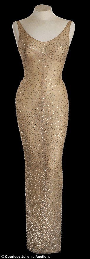 Unique: The dress, pictured, features more than 2,500 crystals and was custom-made for the... Marilyn Monroe Outfits, Dollar Dress, Marilyn Monroe Dress, Glamorous Gowns, Monroe Dress, Marilyn Dress, Hollywood Costume, Iconic Dresses, Norma Jeane