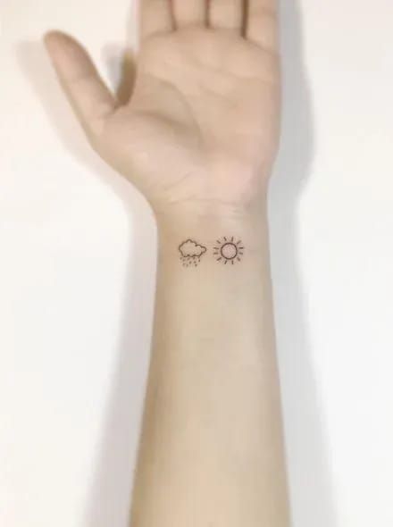 Matching Sun and Rain Cloud Wrist Tattoos Sun And Rain Tattoo, Sun And Clouds Tattoo, Landscape Line Drawing, Rain Cloud Tattoos, Cloud Tattoo Ideas, Cloud Tattoos, Rain Tattoo, Minimal Tattoo Designs, Line Drawing Tattoos