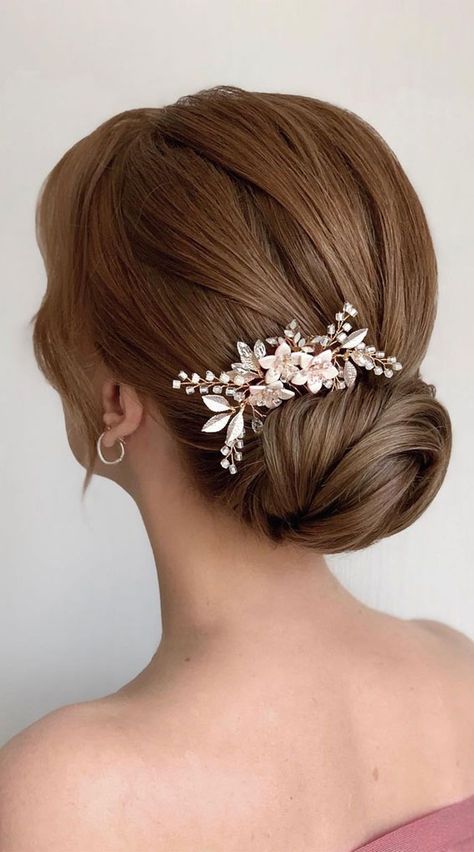 40. Elegant formal updo A stunning formal hair idea for shoulder length. The hair is styled into a gorgeous low bun design. This look... Ball Hairstyles Shoulder Length, Bridal Updo Shoulder Length Hair, Low Bun Wedding Hair Side Part, Shoulder Length Formal Hairstyles Updo, Formal Updos For Medium Length Hair Wedding, Low Side Bun Wedding Hair, Fancy Low Bun, Shoulder Length Formal Hairstyles, Formal Updo