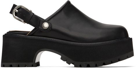 Find Marge Sherwood Black 70's Clogs on Editorialist. Buffed leather slip-on loafers in black. · Square toe · Convertible pin-buckle slingback strap · Pigskin lining · EVA foam rubber platform midsole · Treaded EVA rubber outsole · Platform: H2.25 in Supplier color: Black plain 70s Clogs, Black Clogs Outfit, Rubber Shoes For Women, Marge Sherwood, Clogs Outfit, Black Clogs, Walk In My Shoes, Black Plain, Platform Clogs