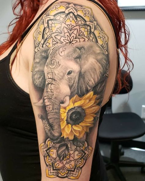 Beautiful Elephant Tattoo, Elephant And Roses Tattoo, Half Sleeve Tattoos For Women Upper Arm Elephant, Elephant Half Sleeve Tattoo, Watercolor Tattoo Elephant, Elephant With Sunflower Tattoo, Elephant Half Sleeve Tattoos For Women, Elephant And Flowers Tattoo Design, Sunflower And Elephant Tattoo