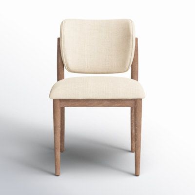 Clean and streamlined, with mid-century vibes. Solid wood forms a finely sculpted frame for upholstered seating. Upholstery Color/Leg Color: Irving Taupe Polyester Blend/Pecan Whitewash | Birch Lane™ Lucille Dining Chair 32.0 H x 21.25 W x 23.0 D in brownFabric in Irving Taupe Polyester Blend / Pecan Whitewash | 19.5" H X 21.25" W X 18.75" D | Wayfair Dining Chairs Warm Neutral, Pottery Barn Coastal Dining Chairs, Comfortable Dining Chairs Pottery Barn, Cream Dining Chairs The Home Depot, Coastal Dining Chairs, Beige Wooden Dining Chairs Upholstered, Coastal Dining, Reading Nooks, Modern Organic