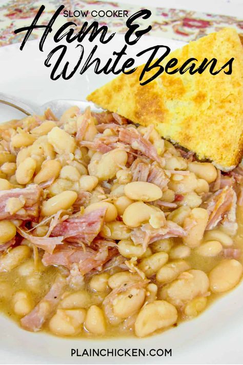 Slow Cooker Ham & White Beans - our favorite way to use our leftover holiday ham! Only 3 ingredients - ham, onion, and dried great northern beans. Cover with water and cook. Serve with some homemade cornbread. Comfort food at its best! #southern #crockpot #leftoverham #slowcooker #hambone Crockpot Ham And Beans, White Beans And Ham, Beans And Ham, Slow Cooker Ham, Ham Bone, Ham And Beans, Northern Beans, Ham And Bean Soup, Crockpot Dishes