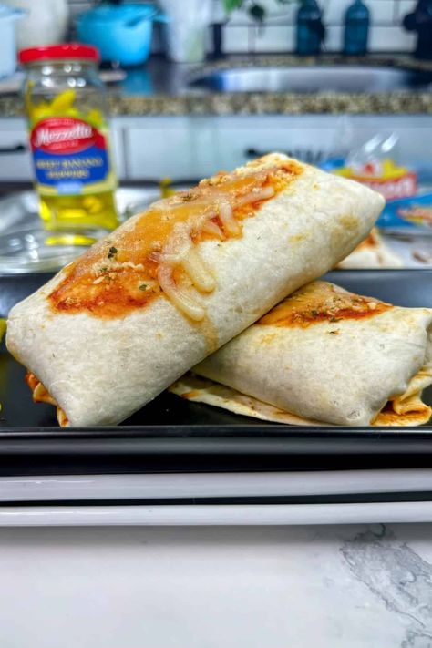 These Baked Pizza Burritos Are The Snack to End All Snacks - Drizzle Me Skinny! Pizza Burritos, Recipe With Pepperoni, Raspberry Cheesecake Fluff, Cheesecake Fluff Salad, Pizza Burrito, Bubble Up Casserole, Tofu Scrambled Eggs, Freezer Burritos, Cheesecake Fluff