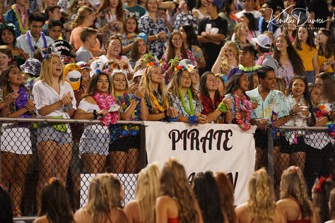 Every single year, the seniors line the fence to cheer on the Pirates. Their themes are the best in FNL!! Surfer Theme Football Game, Lifeguard Theme Football Game, Pirate Theme Football Game Outfit, American Theme Football Game, Football Game Student Section, Sam Montgomery, Football Game Outfit Highschool, School Traditions, Friday Night Football