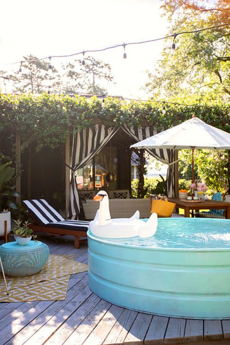 Love this aqua painted stock tank pool is sitting on her deck for quick dips, doesn't it look inviting? You know we love color so the aqua really caught our eye. #stocktank #stocktankpool #tankpool #stockpool #stockpooldiy #stockpoolideas Temporary Pool, Stock Tank Swimming Pool, Tank Swimming Pool, Stock Pools, Diy Stock Tank, Stock Tank Pool Diy, Stock Tank Pool, Tank Pool, Stock Tank