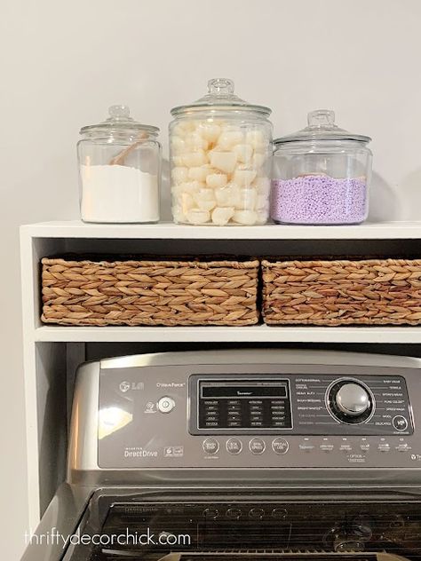 Easy DIY laundry shelf over washer and dryer | Thrifty Decor Chick | Thrifty DIY, Decor and Organizing Laundry Shelf Over Washer, Diy Laundry Shelf, Shelf Over Washer And Dryer, Florida Rooms, Laundry Shelf, Laundry Room Tables, Mdf Trim, Small Laundry Room Ideas, Laundry Shelves