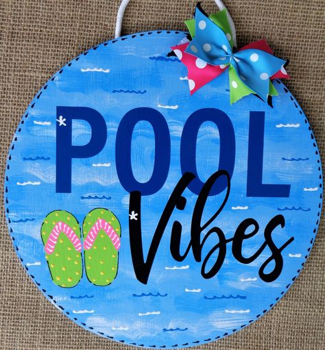 "This POOL VIBES sign will let all your friends and family know just what the swimming pool means to you! What a great way to let your guests know that the swimming pool is a fantastic place to be! The sign measures 11\" in diameter and features tole painted flip flops and vinyl lettering on a watery blue background. Be sure to use the coupon code SAVE10 to save 10% off any of our signs when purchasing ANY 2 or more signs." Pool Signs Outdoor, Pool Signs Diy, Painted Flip Flops, Disneyland Quotes, Pool Captions, Door Rounds, Swimming Pool Decorations, Wooden Rounds, Swimming Pool Signs