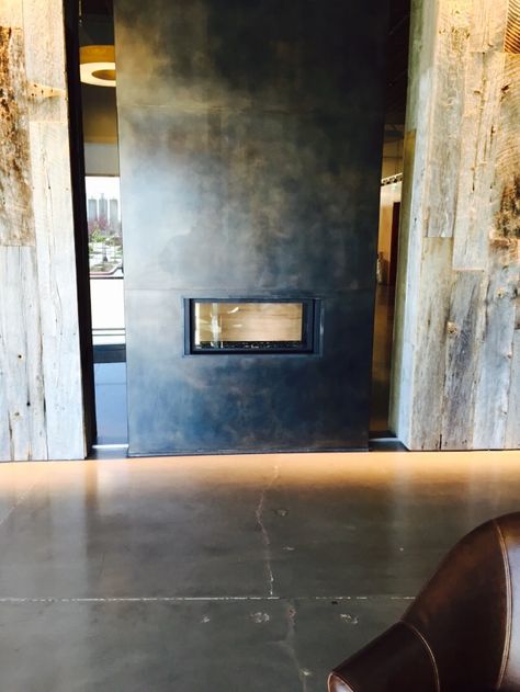 Linear fireplace wrapped in cold rolled steel. Rolled Steel Fireplace, Wrapped Fireplace, Panel Fireplace, Steel Fireplace, Cabin Fireplace, Fireplace Fronts, Fireplace Cover, Linear Fireplace, Barn Interior