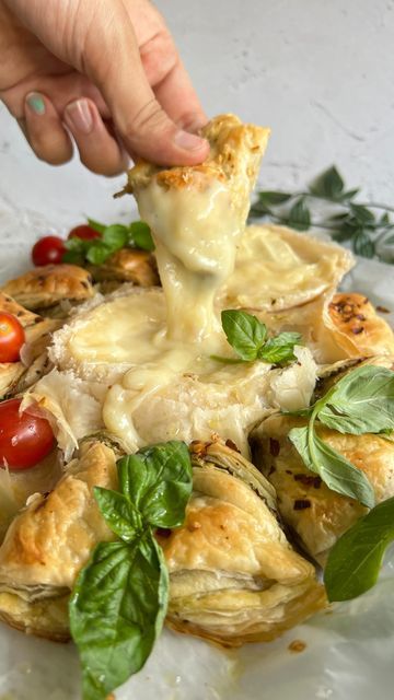 Vidhi Doshi on Instagram: "CAMEMBERT PESTO PUFF! Saw this on a YouTube short and HAD to recreate it! So so goooood! And SO EASY!!! And YUMMM! Got the Camembert from @sweetstuffgourmetfoods and they have an amazing selection of cheeses, definitely check them out! What is Camembert? It is a soft, creamy, ripened cows cheese that gets OOOZY once it’s heated. For the recipe: I’ve done it super simple. All you need to do is get a couple of puff pastry sheets, 2 here. Cut them into rounds a Camembert Cheese Recipes Puff Pastries, Camembert Puff Pastry, Camembert Cheese Recipes, Camembert Recipes, Puff Pastries, Cow Cheese, Puff Pastry Sheets, Pastry Sheets, Puff Pastry Recipes