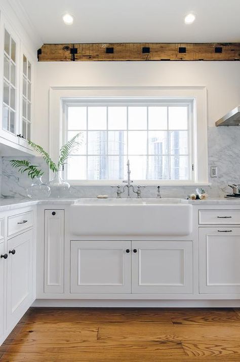 An extra wide farm sink surely stands out along with a satin nickel vintage faucet. Shaws Farmhouse Sink, Xl Kitchen Sink, Inset Sink Kitchen, Shaws Sink, Compact Kitchens, Working Kitchen, Farmhouse Sink Faucet, Model Dapur, Renovated Kitchen