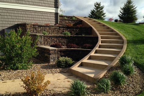 Terraced Retaining Wall-Hastings, MN Walkout Basement Patio, Steep Gardens, Landscaping A Slope, Sloped Yard, Backyard Trampoline, Sloped Backyard, Landscaping Retaining Walls, Garden Stairs, Sloped Garden