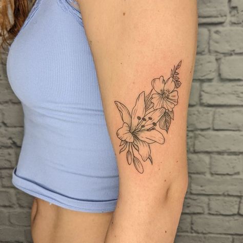 Lily Tattoos For Women Forearm, Flowers Elbow Tattoo, Tiger Lily Tattoo Shoulder, Bold Line Flower Tattoo, Lilly Tattoo Arm, Lily Arm Tattoo For Women, Lillie’s Tattoo, Realistic Lily Tattoo Design, Lily Tattoo Arm